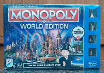 SLIGHT BOX DAMAGE MONOPOLY HERE & NOW WORLD EDITION BOARD GAME By HASBRO