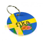 Nyckelring fika kanelbulle blå-gul med svart text