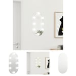 The Living Store Spegel med LED-lampor 60x30 cm glas oval -  Speglar
