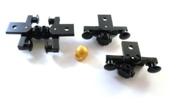 2 pairs of LEGO "railway clutch / buffer with magnet" in black. Includes golden helmet.