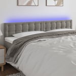 Sänggavel LED ljusgrå 160x5x78/88 cm sammet
