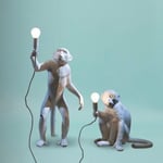 The monkey lamp standing outdoor bordslampa vit