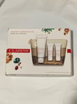 Clarins Body Care Collection - Lotion, Scrub, Hand Cream, Shimmery Bag *NEW*
