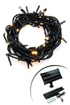 Konstsmide 3618-800SP Guirlande lumineuse solaire à LED, avec télécommande et câble USB, 400 diodes ambrées, pour extérieur, 8 W, câble noir, 4 piles au lithium, 1 pile CR2025 (incluse)