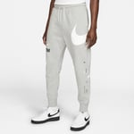 Pantalon semi-brossé Nike Sportswear Swoosh pour Homme - Gris