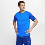 The Nike Dri-FIT Strike Top is made from breathable, sweat-wicking fabric to help keep you cool, dry and comfortable on the field. This product at least 50% recycled polyester. Men's Short-Sleeve Football - Blue