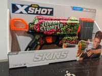 X Shot Skins - Flux - Zombie Stomper -  Blaster w/ 8 Darts - Brand New