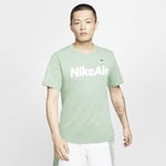 The Nike Air T-Shirt features a big graphic and soft cotton fabric for all-day comfort. Men's - Green