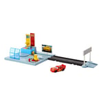 Disney and Pixar Cars On The Road Dinoco Rusteze Racing Center Playset with Lightning McQueen Toy Car, Launcher, Short Track and Spinning Pitty, Toy Gift for Kids, HGV69