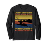 Life Isn't About Waiting For The Storm To Pass It's About Le Long Sleeve T-Shirt