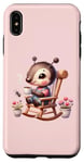Coque pour iPhone XS Max Fauteuil à bascule mignon et confortable sur fond rose.