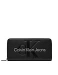 Calvin Klein Plånbok sculpted zip around black metallic logo CK -
