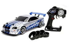 Jada Toys 253209000 Fast&Furious Fast And The Furious Fast & Furious Nissan Skyline GTR R34 RC Car with Radio Remote Control, Drift Function, 4 Tyres, USB Charging, Scale 1:10, Blue/Silver