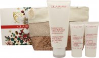 Clarins Body Care Gift Set 200ml Moisture Rich Body Lotion + 30ml Hand And Nail Treatment Cream + 30ml Exfoliating Body Scrub + Wash Bag