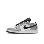 The Air Jordan 1 Low Older Kids' Shoe pairs the classic design of original AJ1 with premium materials for an iconic look. - Grey
