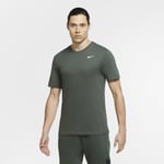 The Nike Dri-FIT T-Shirt delivers a soft feel, sweat-wicking performance and great range of motion to get you through your workout in total comfort. Men's Training - Green